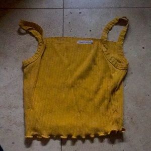 Yellow ruffle top